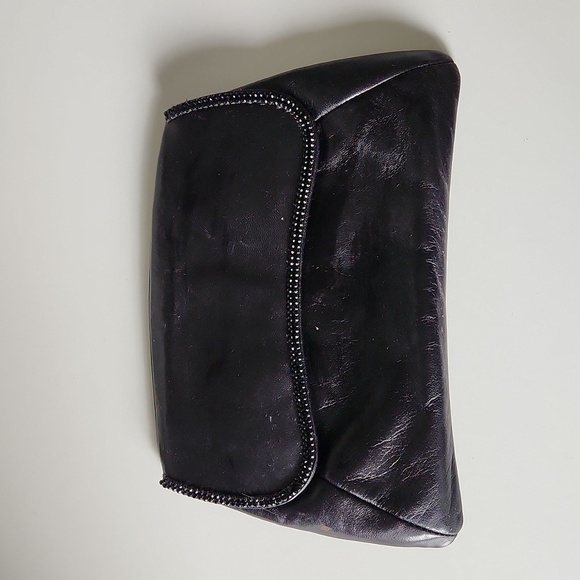 Swarovski Handbags - SWAROVSKI | Leather clutch crystals embellished black